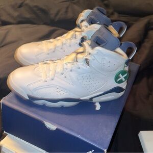 Literally wore once Jordan size 9 white with blue